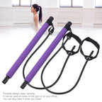 Close-up of Pilates bar with resistance bands in a home setting.