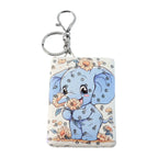 Pocket makeup mirror keychain attached to bag strap for easy access