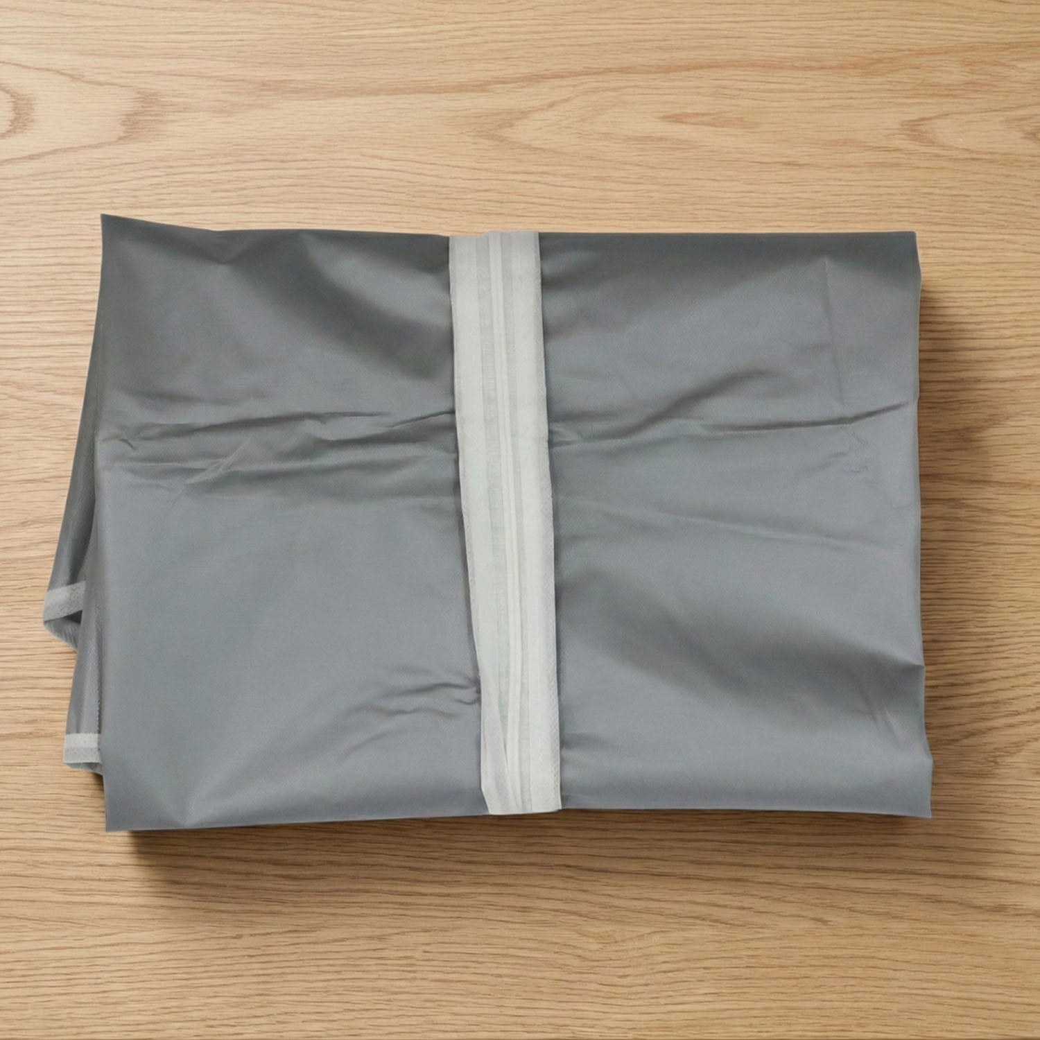 Multiple breathable garment covers neatly organized in wardrobe