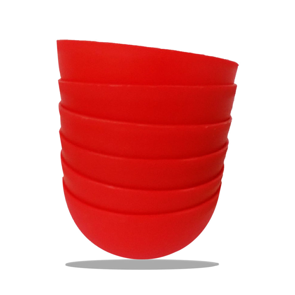 Arrangement of three durable soup bowls with matching spoons and saucers on a clean surface.
