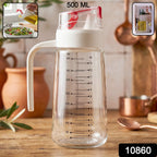 500ml glass oil dispenser with auto-flip cap and measuring markings, ideal for salad dressings and cooking oils
