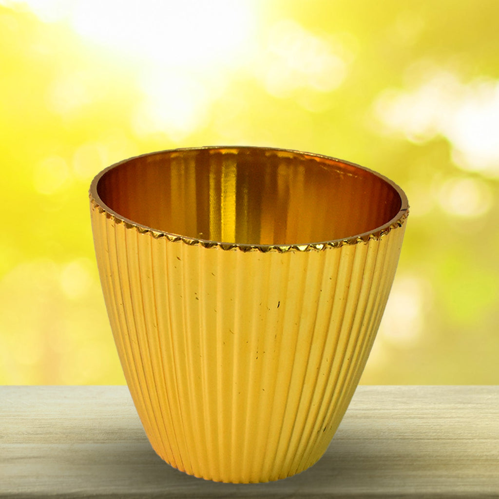 Plastic Flower Valencia Pot placed in a vibrant garden setting