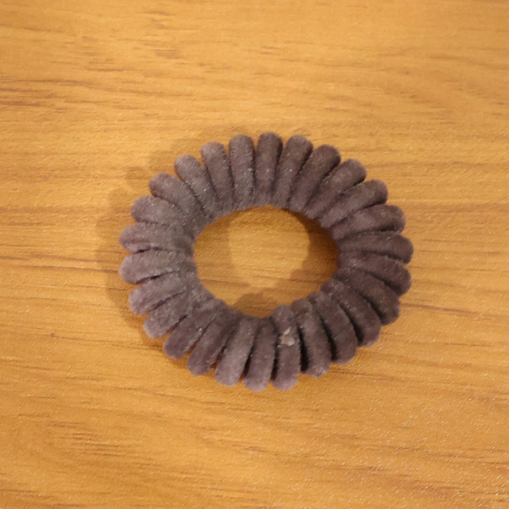 Coiled waterproof telephone wire hair band in coil design