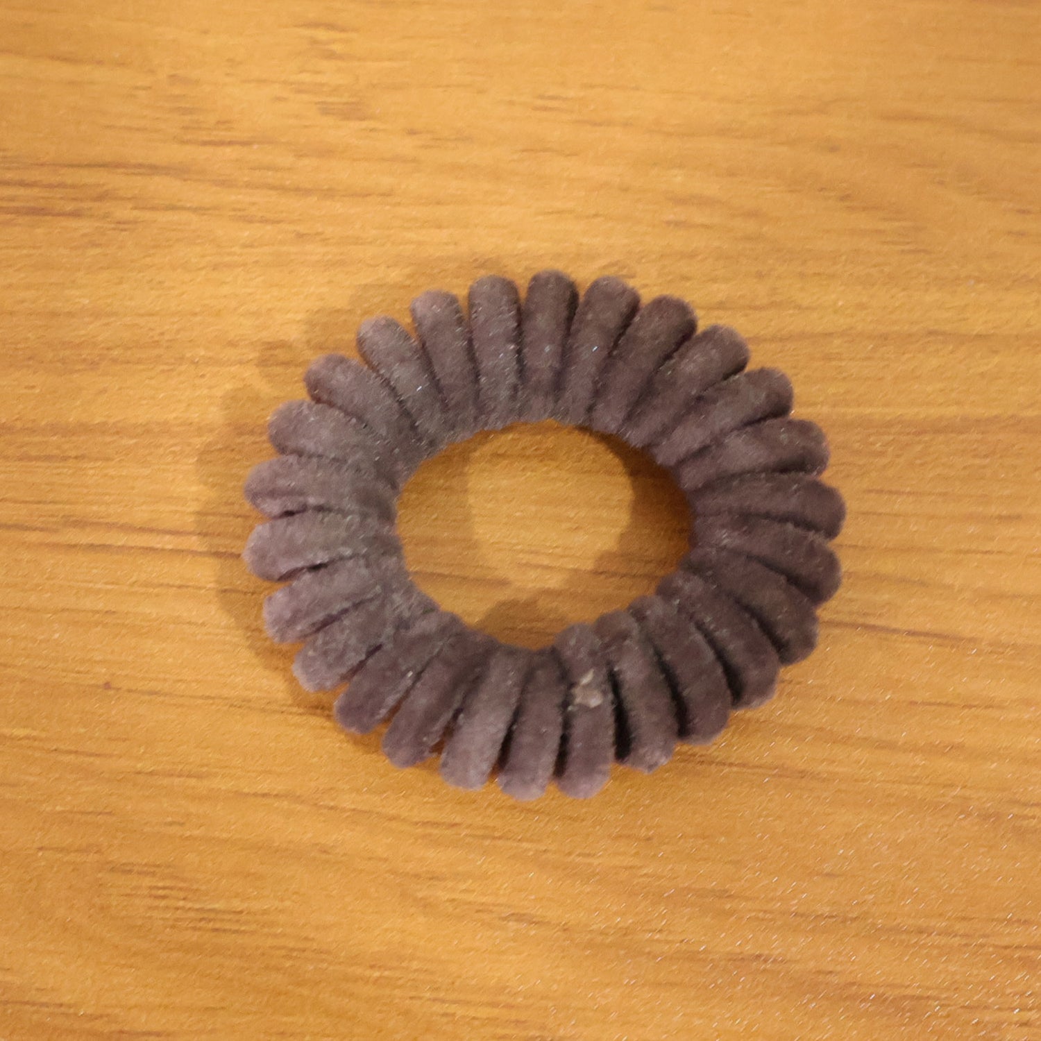 Coiled waterproof telephone wire hair band in coil design