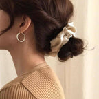 Pack of premium satin scrunchies in various pastel shades
