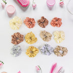 Stretchy satin hair scrunchie displaying smooth satin fabric texture