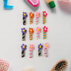 Telephone Wire Hairbands Display Featuring Various Cute Designs