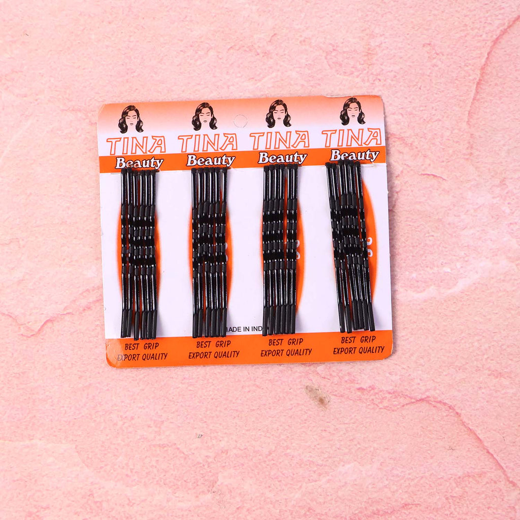 Angled view of black hair bobby pins for hairstyling