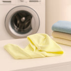 Comparison showing the VelvaBloom turban towel versus a traditional heavy bath towel.