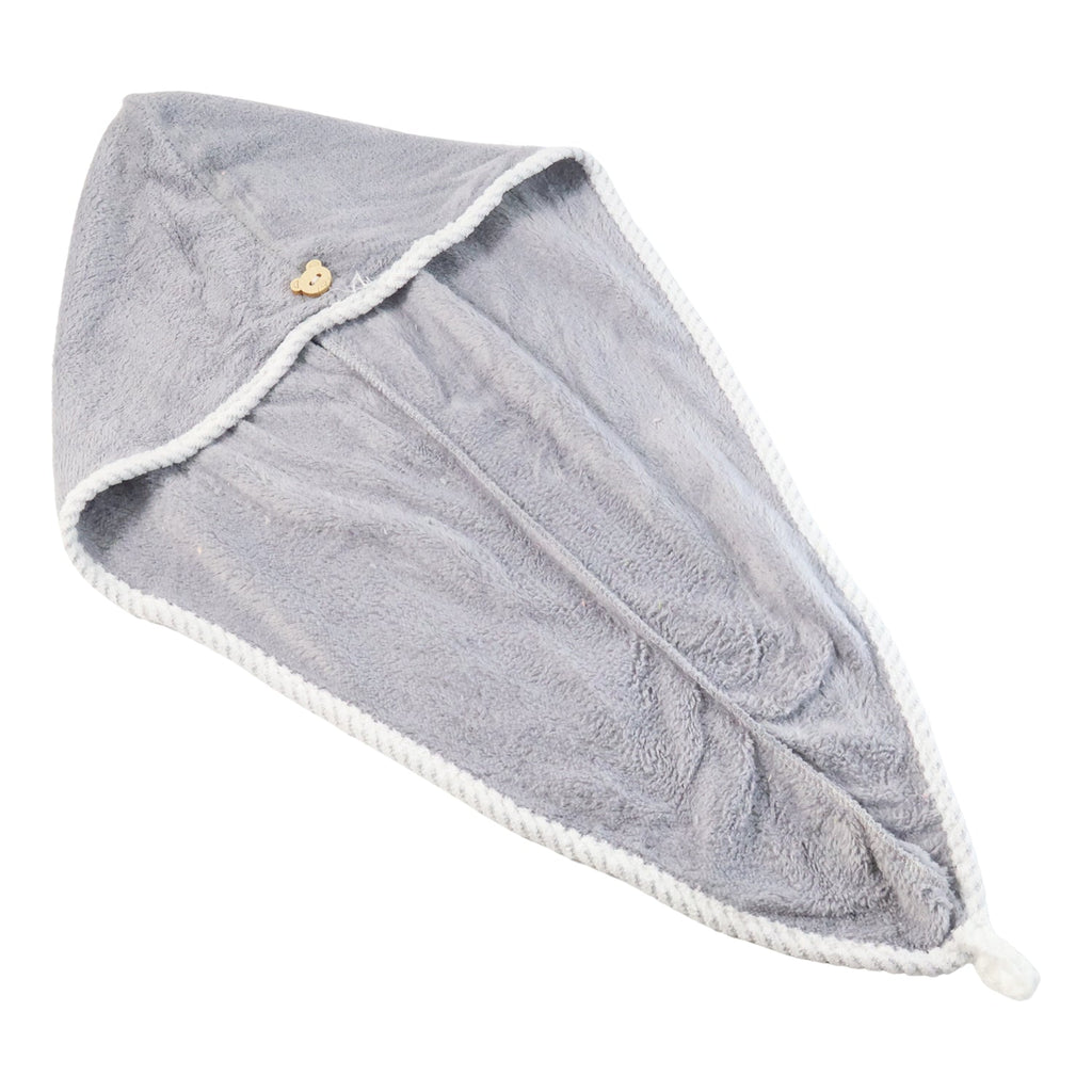 Folded quick-dry hair towel in a vibrant pink color.