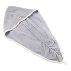 Folded quick-dry hair towel in a vibrant pink color.