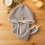 Comparison showing the compact hair drying towel wrap next to a bulky traditional towel.