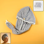 Woman demonstrating how to use a pink hair drying towel wrap from Calm & Curl.