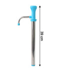 Close-up view of manual oil pump dispenser mechanism in action