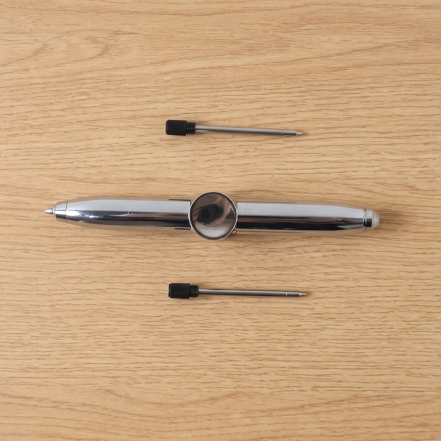Compact multifunction spinner pen for stress relief and writing