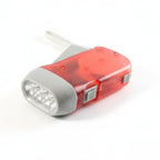 Manual generator-powered 2-LED flashlight with ergonomic pig-shaped design