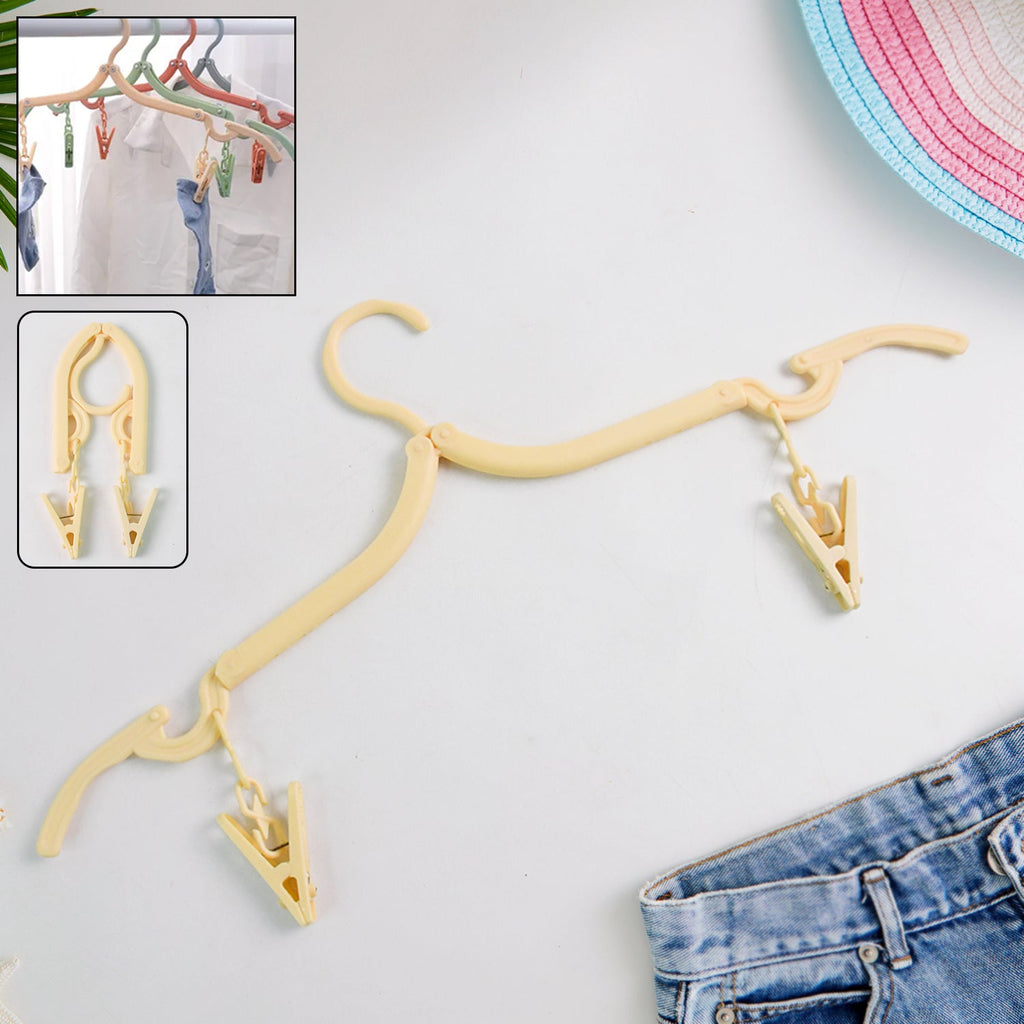 Foldable cloth hanger with dual clips for space-saving laundry drying