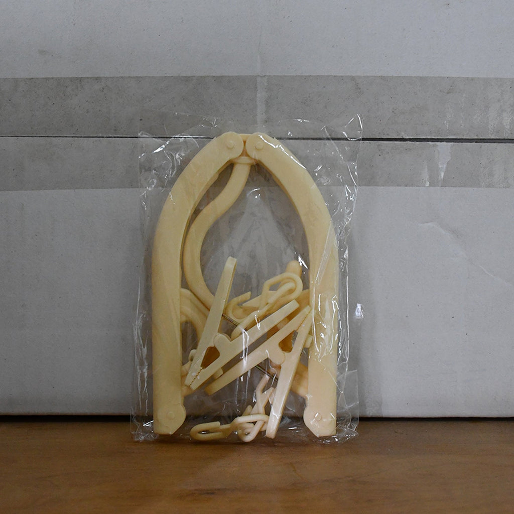Multipurpose foldable hanger with durable plastic material and dual clips