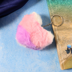 Side view displaying thickness of plush heart keychain