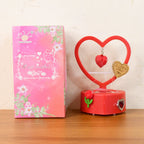Lifestyle image of heart-shaped LED decorative lamp emitting soft romantic glow
