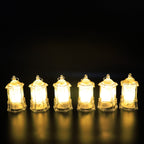 Close-up of LED decorative candle light set with soft warm illumination