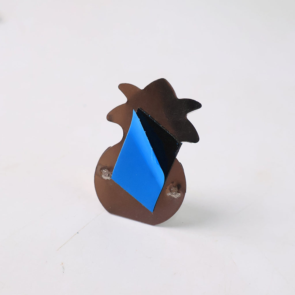 Close-up image of silver finish wall-mounted agarbatti holder with adhesive