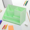 Stylish multi-compartment desk organizer in a neutral color.