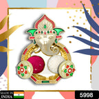 Decorative Puja Thali with small kumkum holders, ideal for festive celebrations.