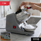 Close-up of stainless steel blades and bowl of ice crusher