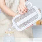 The foldable ice tray in its bottle form, filled with water and ready for freezing.