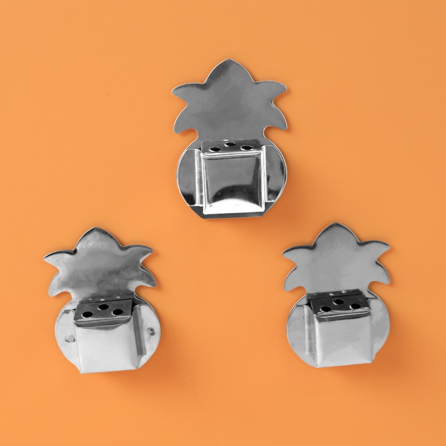 Brass finish metal agarbatti holder wall mount designed for spiritual décor.