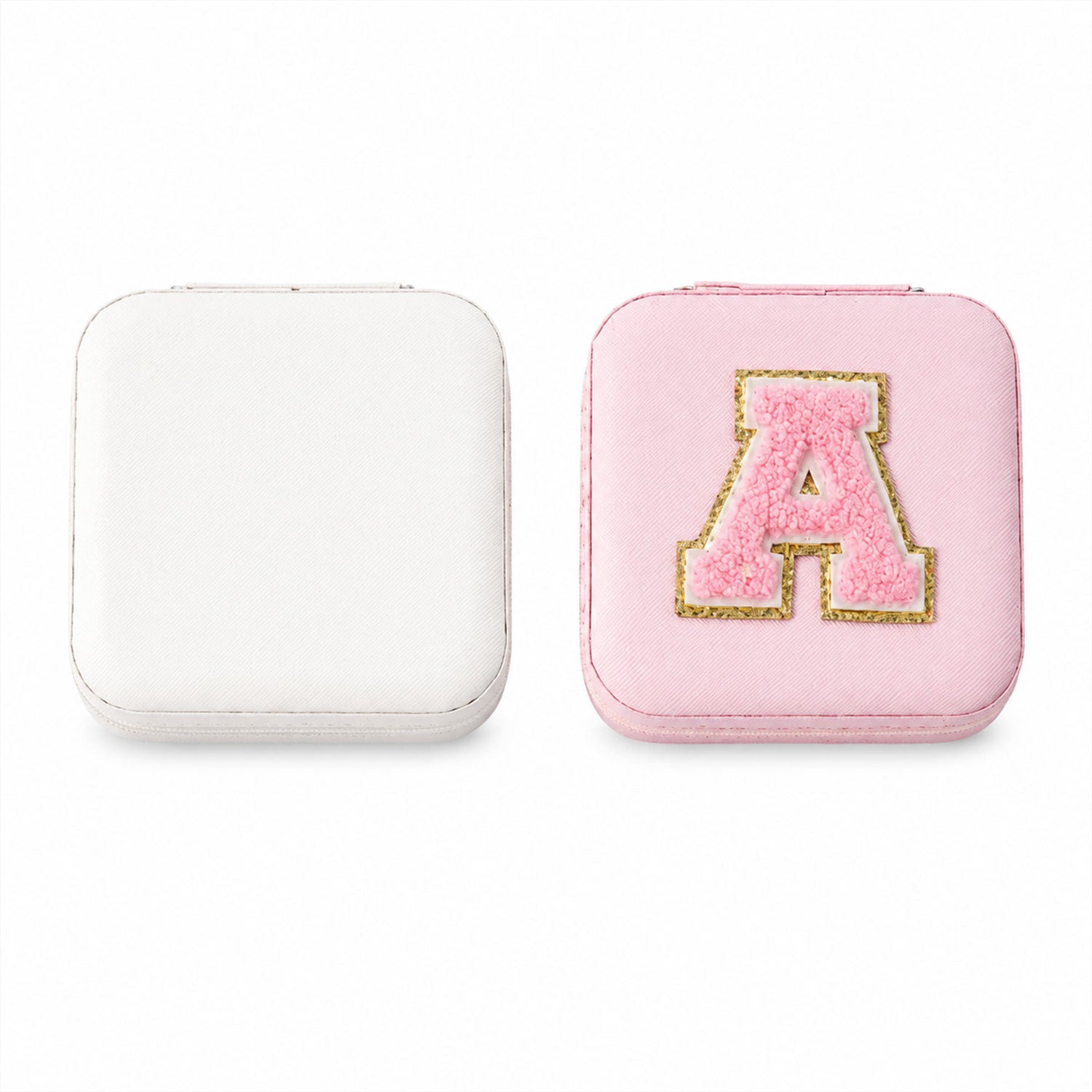 The LilyGleam travel jewellery box placed next to travel essentials like a passport and sunglasses.