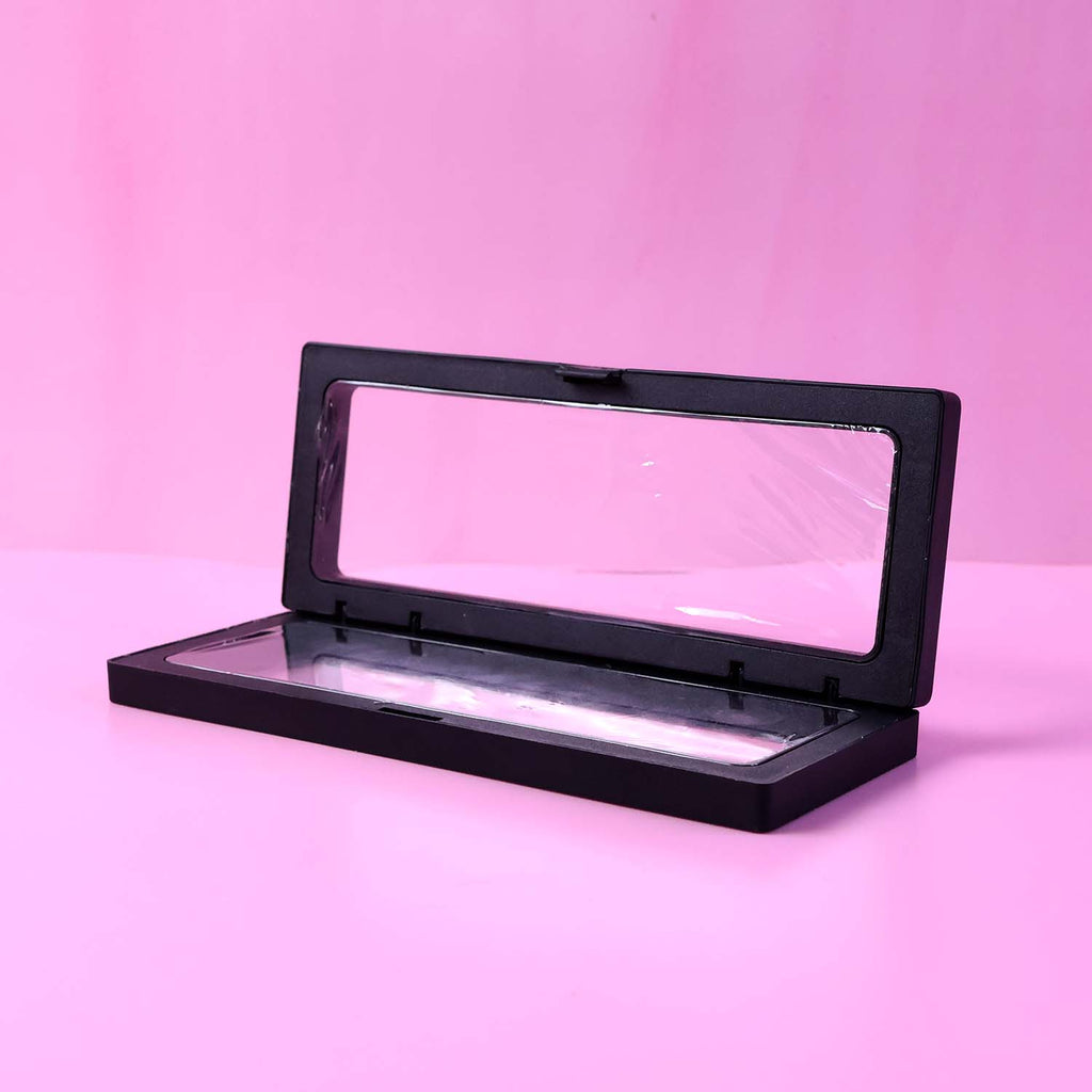 Closed top view of transparent floating jewelry display box 18x7 cm with secure magnetic lock