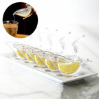 Stylish portable juicer ready for use with various citrus fruits.