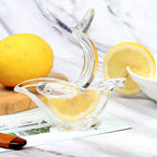 Transparent plastic citrus juicer showcasing its elegant and functional design.