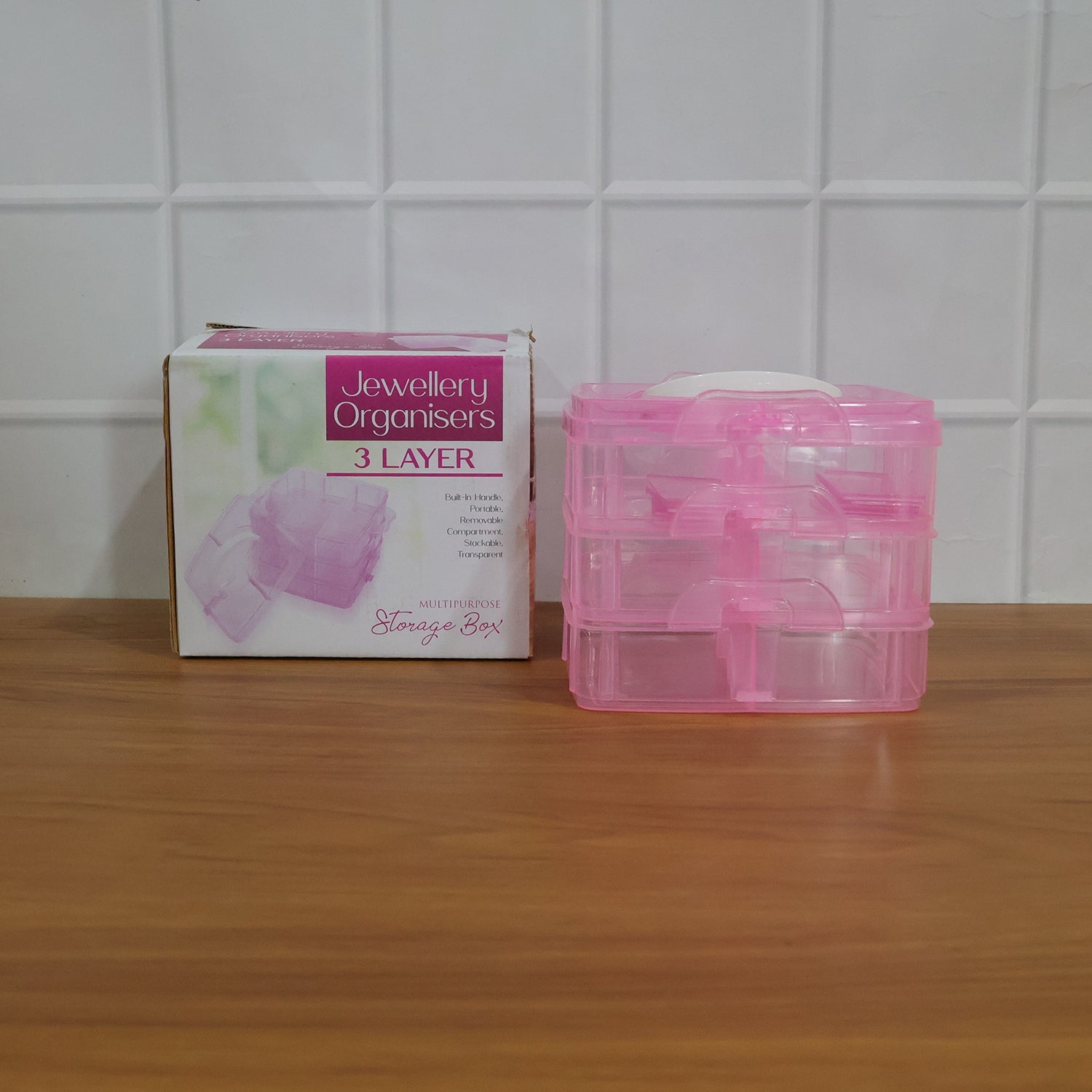 Clear plastic storage box suited for jewelry, crafts and small essentials