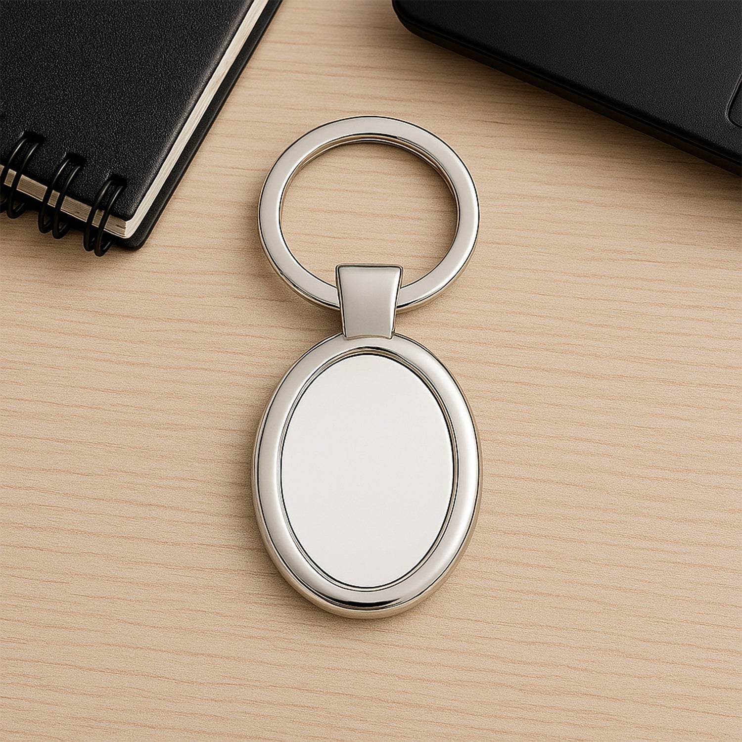 Oval shape metal keychain with premium chrome finish for personal use