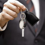 Metal keychain with oval shape and sturdy key ring mechanism