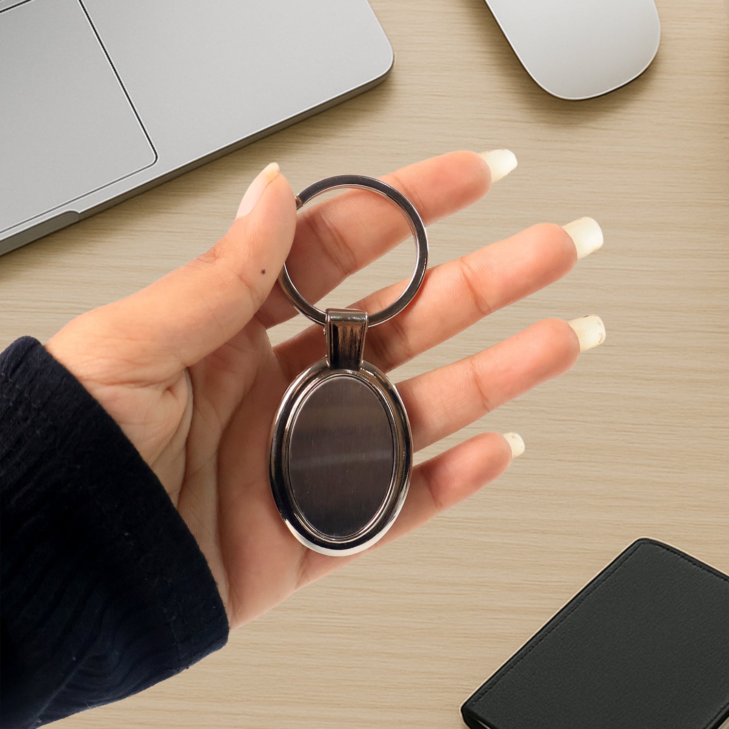 Lightweight yet robust oval metal keychain perfect for everyday use