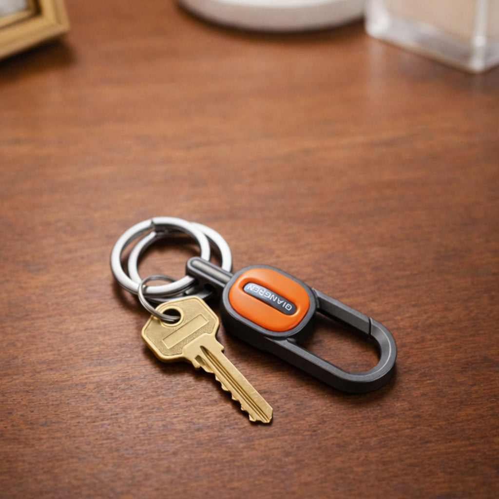 Push lock mechanism on the metal keychain for secure attachment