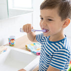 Soft bristles and spring frog toy design on kids toothbrush