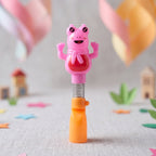 Kids cartoon spring frog toothbrush with playful spring toy detail