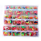 Selection of colourful rubber bands and plastic hair clips suitable for children's hairstyles.