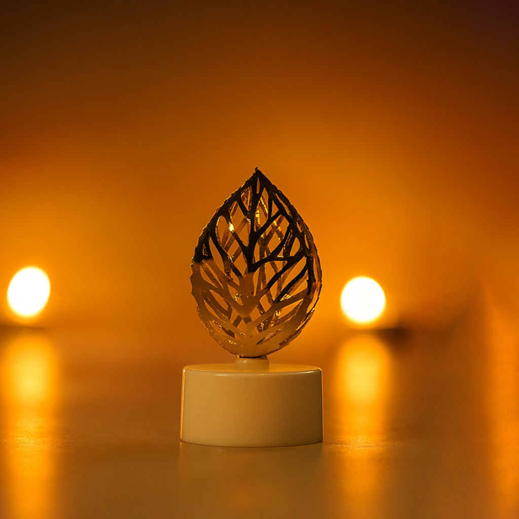 Golden leaf shaped flameless candles arranged for home decoration