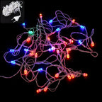 Multi-color globe bulb LED string lights in festive setting