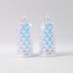 Pair of holographic decorative LED candle lights glowing warmly for home decor