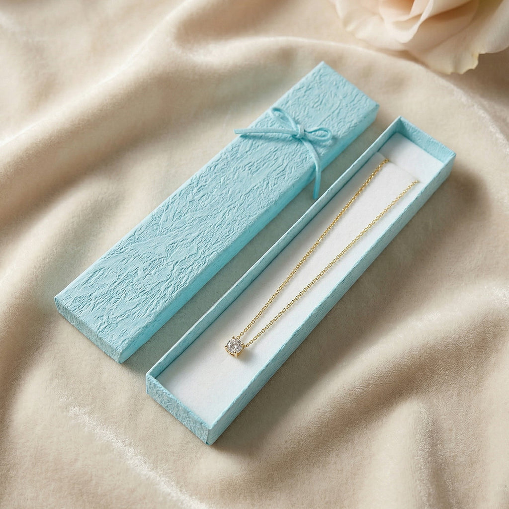 Jewelry gift box suitable for necklaces and chains, with interior storage
