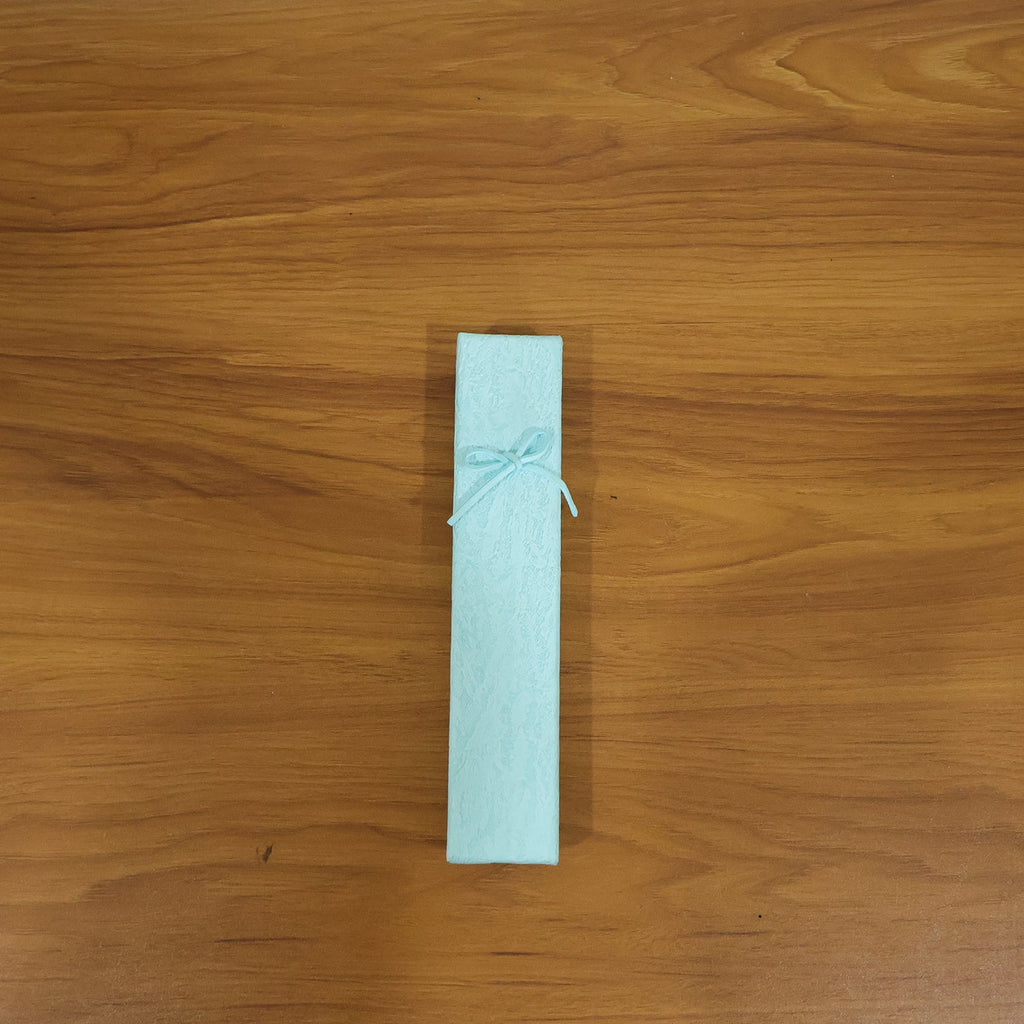 Jewelry gift box with necklace inside, styled for gifting