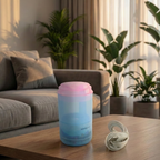 Mini humidifier displaying continuous and intermittent mist modes.