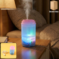 Portable Mini Humidifier emitting a cool mist for improved air quality.